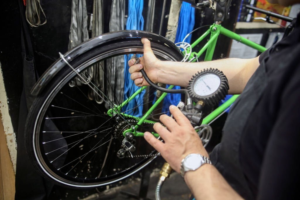 Why use a pressure gauge for bicycle tires?